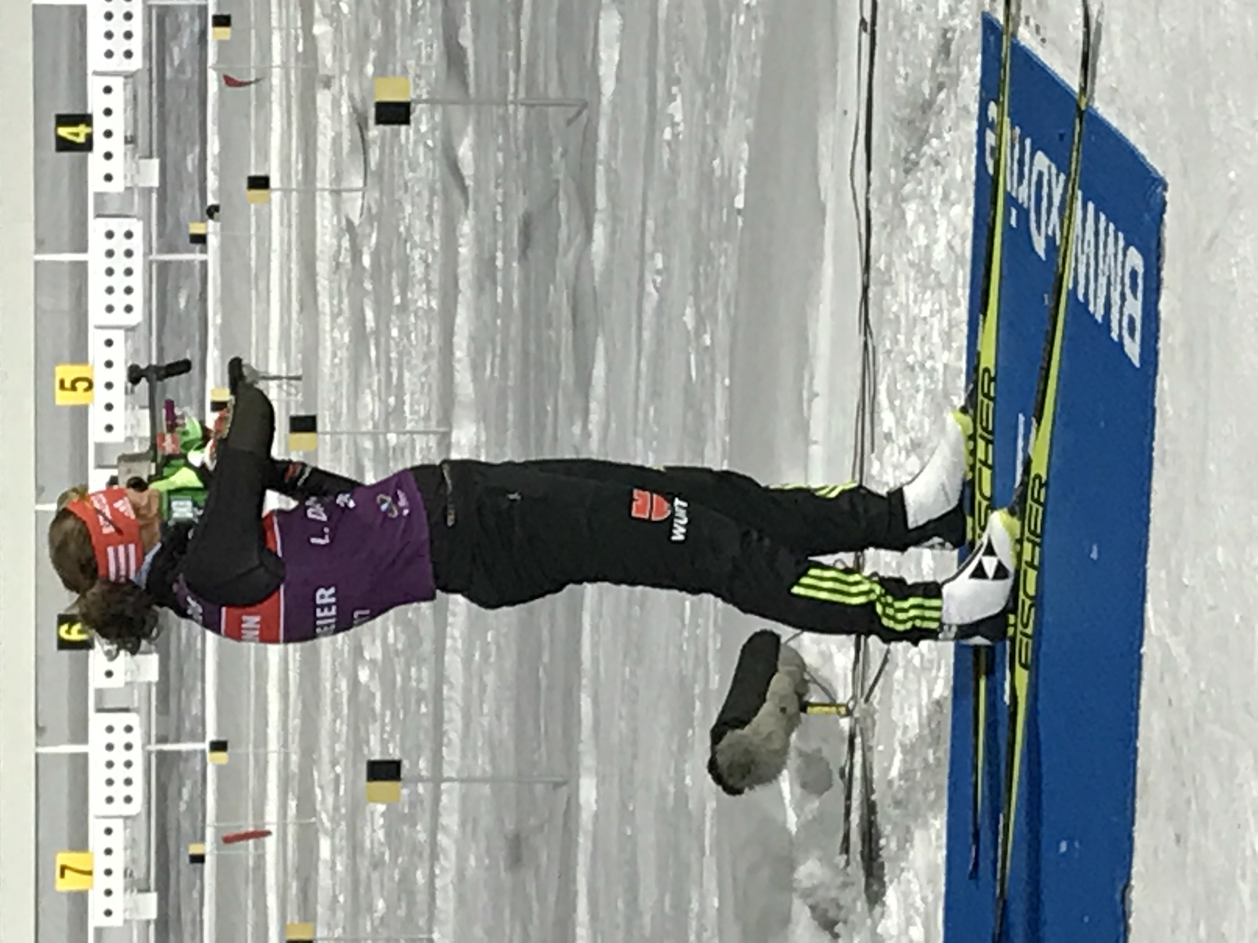 German biathlete Laura Dahlmeier shoots her rifle at a bank of targets from the standing position in Kontiolahti, FIN prior to a world cup race in March 2017.