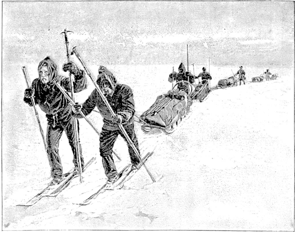 Two figures on skis with two poles of unequal length (the longer one fitted with a small ice axe head) pull a fully-loaded supply sled across the snow; following behind are four similarly-equipped skiers pulling sleds.